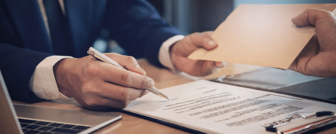 A lawyer discussing rates with a client